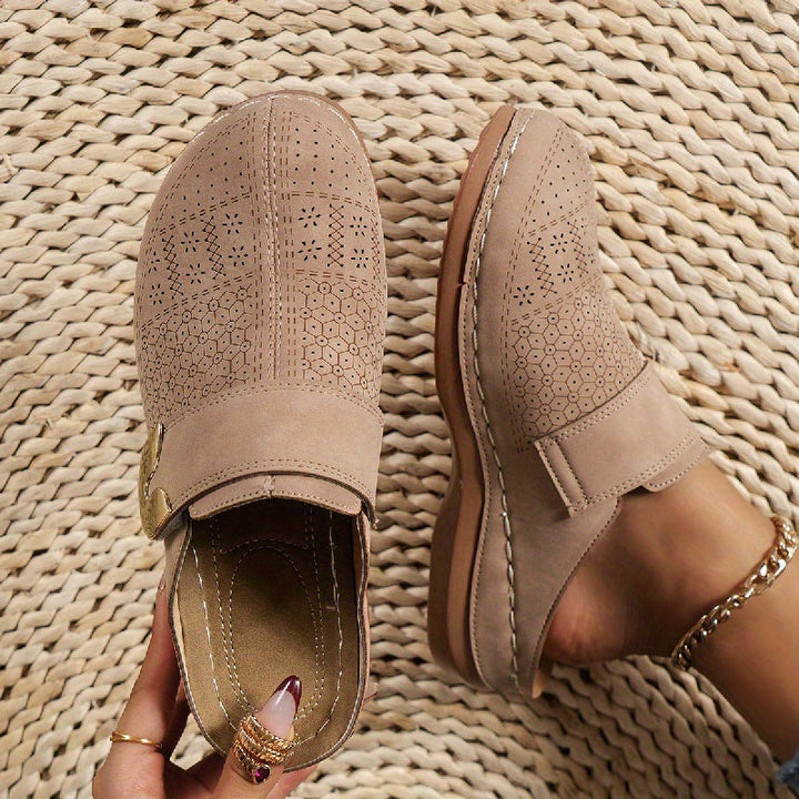 Women's orthopedic slippers with arch support & non-slip grip for healthy, comfortable feet.