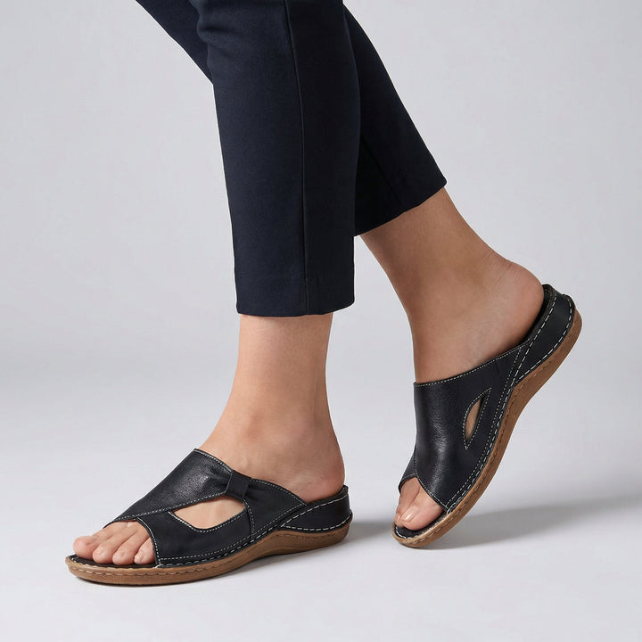 Women's orthopedic open-toe comfort slide sandals. Ideal supportive footwear for casual summer daily wear and walking.
