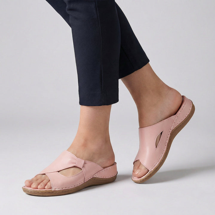 Stylish casual slip-on women's summer sandals. Open-toe comfort slides offering supportive daily wear footwear.