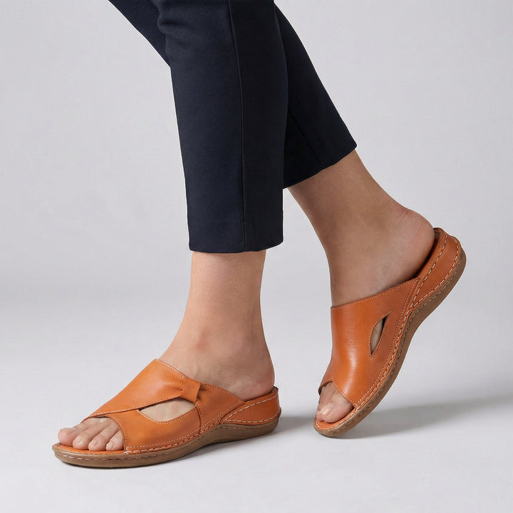 Women's open-toe orthopedic comfort slides. Supportive slip-on sandals ideal for casual summer daily wear and walking.