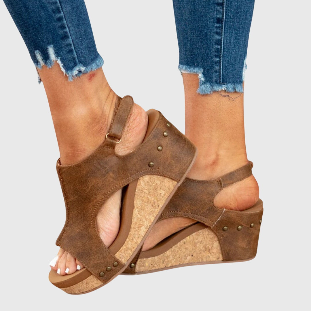 Step into comfort with women's orthopedic peep toe wedge sandals, offering arch support & style.