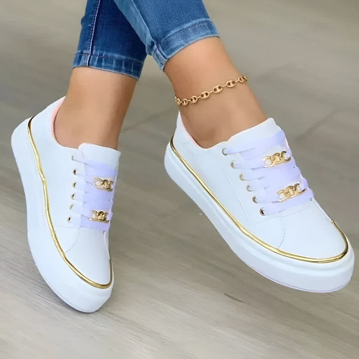 Women's orthopedic platform trainers with gold accents. Comfortable lace-up fashion sneakers, ideal for everyday wear.