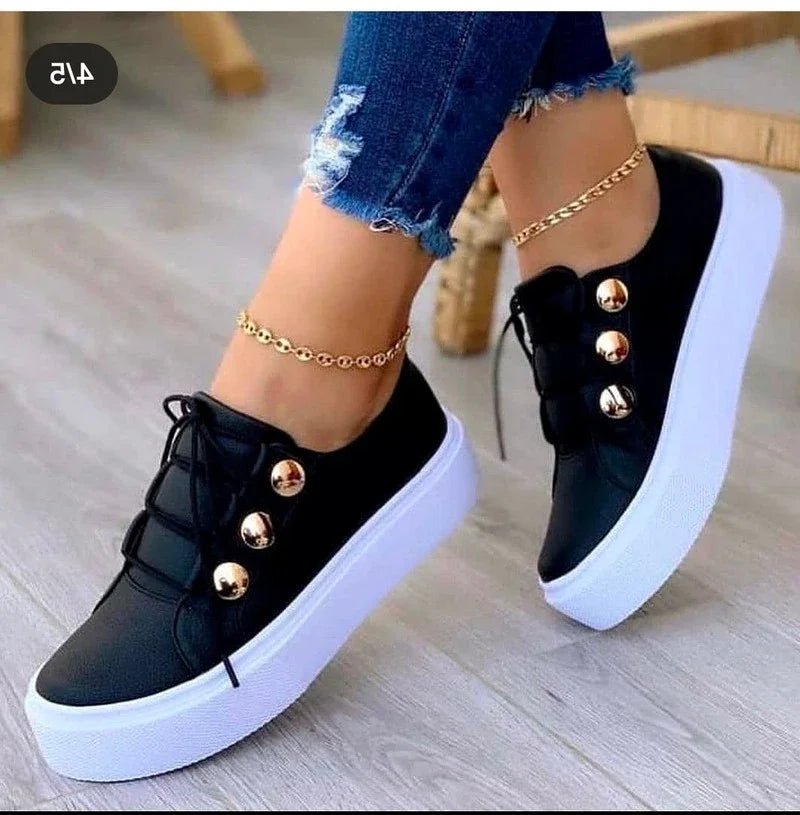 Women's orthopedic platform trainers with gold studs, lace-up design, and chunky sole for fashion and comfort.