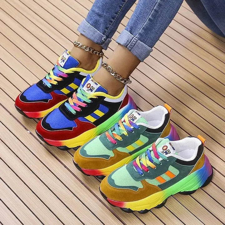 Vibrant women's rainbow comfort trainers, lightweight, offering stylish support for walking & activewear.