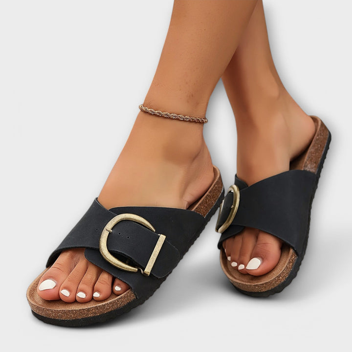 Women's orthopedic sandals in black, offering all-day comfort, arch support, and a casual summer style.
