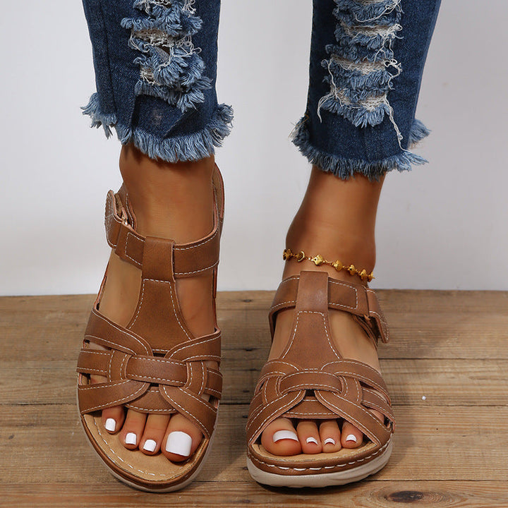 Orthopedic women's sandals featuring adjustable Velcro straps & superior arch support for ultimate comfort & foot relief.