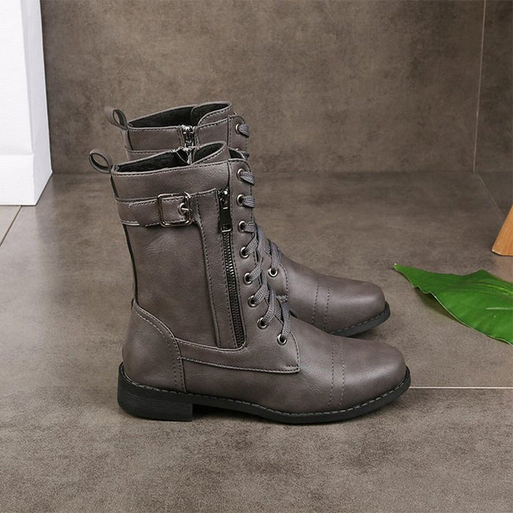 Versatile women's orthopedic walking boots with side zip for comfort & style.