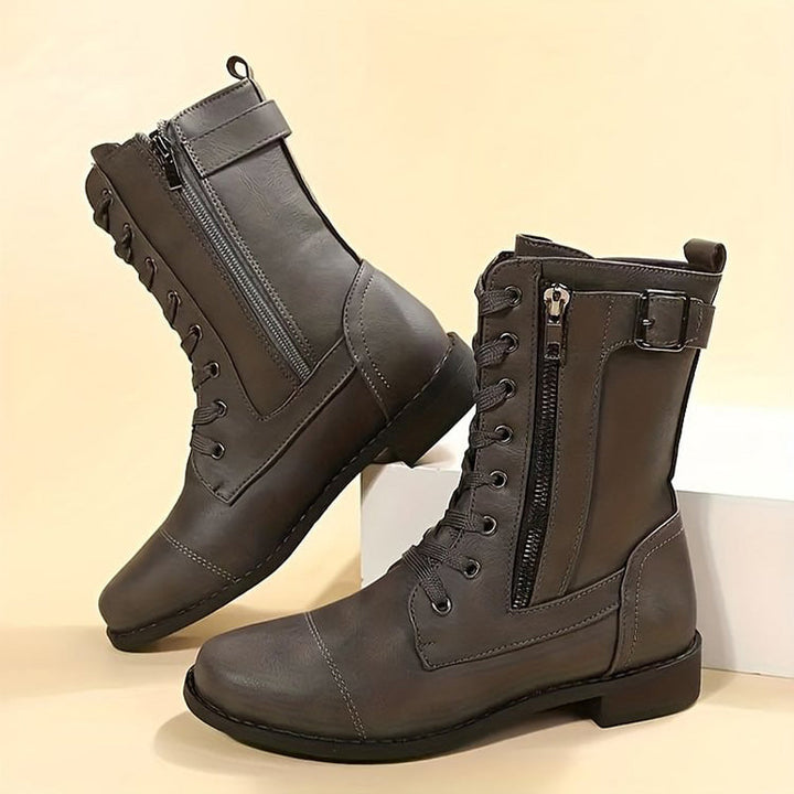 Orthopedic women's boots with arch support for comfortable walking all day.