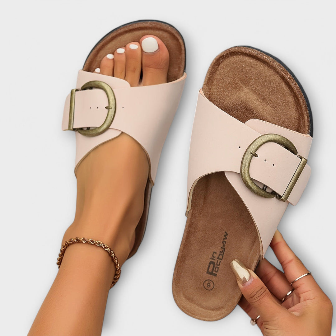 Arch support slide sandals for women, comfortable slip-on design with adjustable straps for active feet.