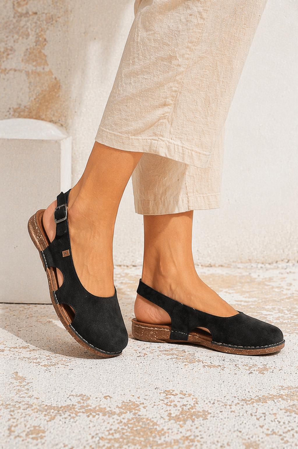 Comfortable women's slingback sandals with adjustable strap & cushioned sole for everyday wear.
