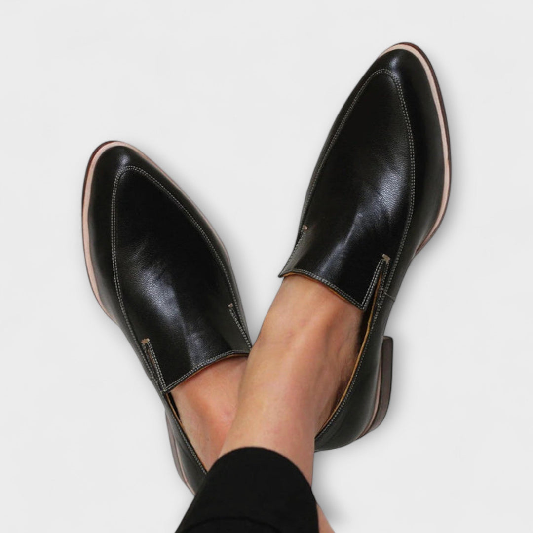 Women's orthopedic slip-on flat loafers with arch support. All-day comfort for walking & work.