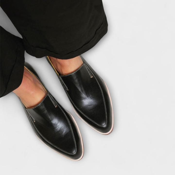 Comfortable women's slip-on flat loafers for everyday wear. Versatile casual & work shoes with arch support.