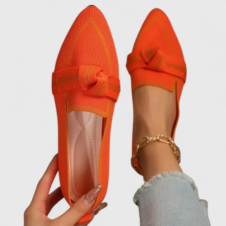 Stylish women's slip-on loafers featuring an elegant bow detail. Perfect casual or work flats with orthopedic comfort.