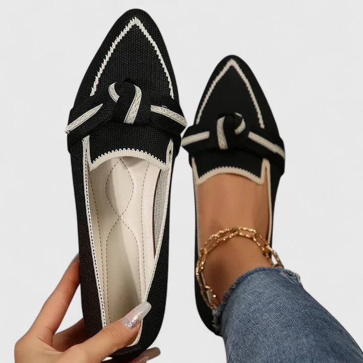 Close-up of the elegant bow detail on women's orthopedic slip-on loafers. Comfortable, stylish flats for women.