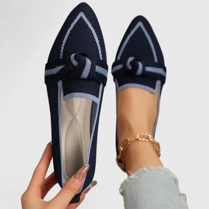 Orthopedic comfort sole on women's slip-on bow loafers. Durable, supportive elegant flats for all-day wear.