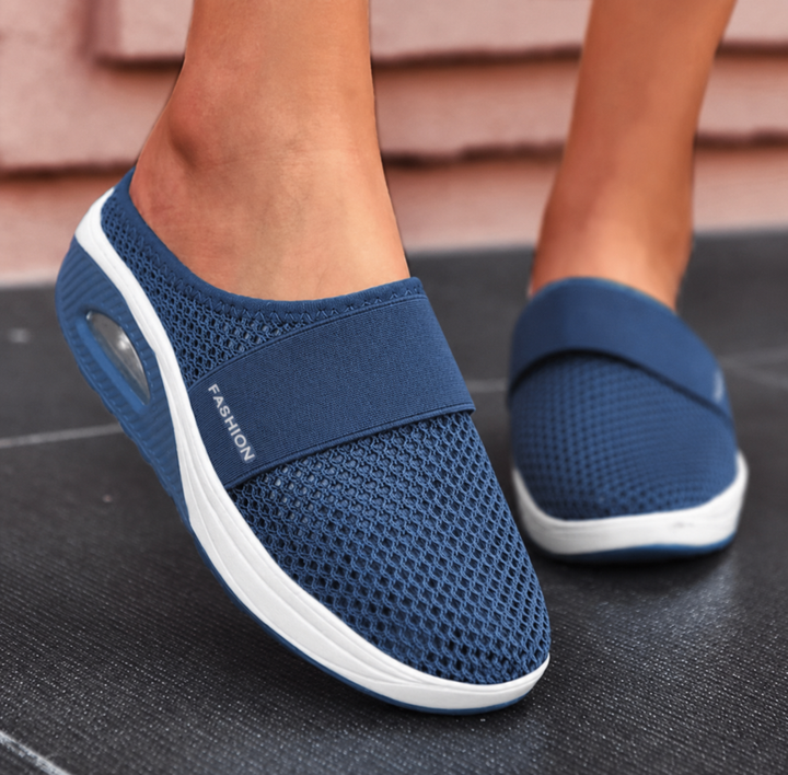 Breathable women's orthopedic sandals with arch support; comfortable slip-on design for all-day wear & foot relief.