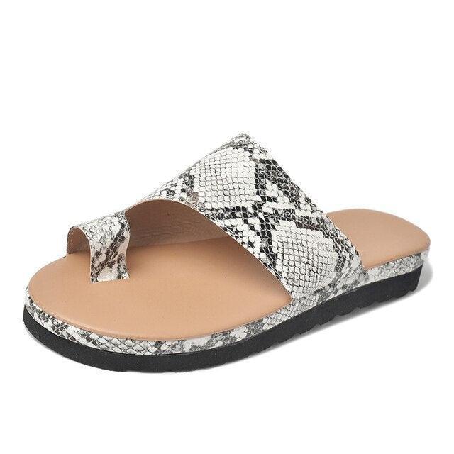 Women's orthopedic slip-on sandals with essential toe-support for comfortable walking.