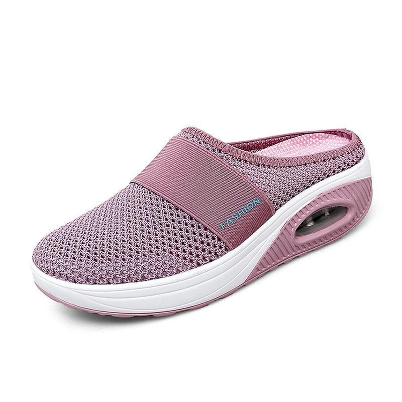 Cushioned insole of women's orthopedic slip-on shoes for superior arch support & comfort.