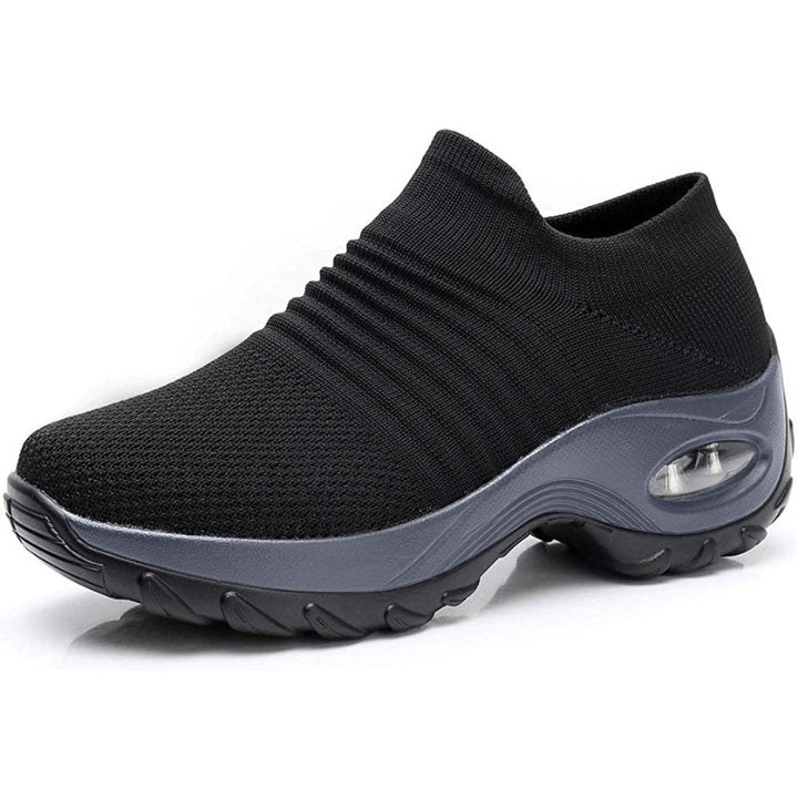 Women's orthopedic slip-on trainers, offering all-day comfort with arch support for walking.
