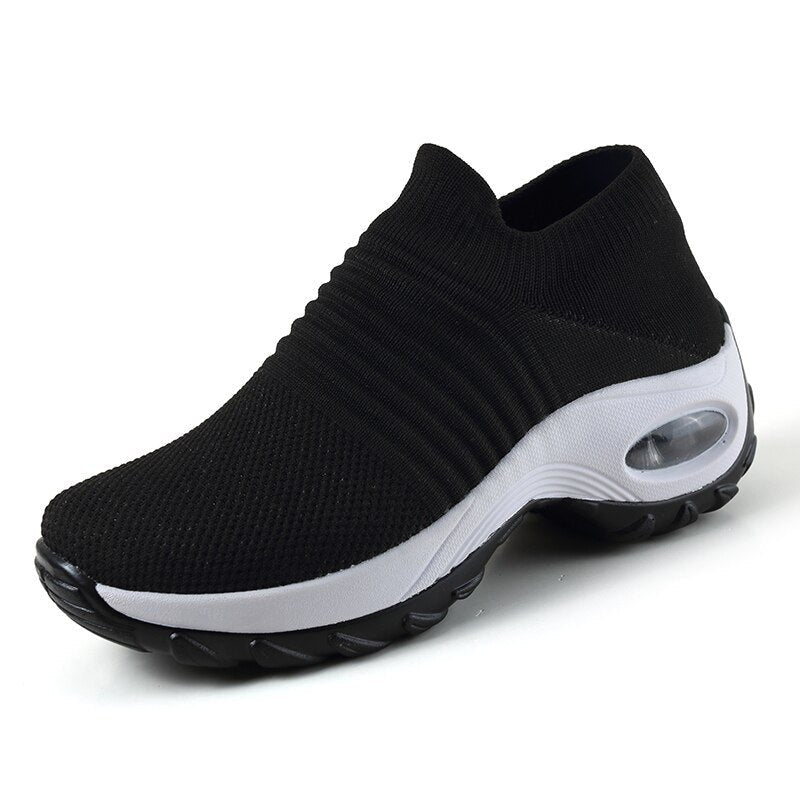 Orthopedic women's trainers with advanced arch support and air cushioning, ensuring comfortable walking shoes.