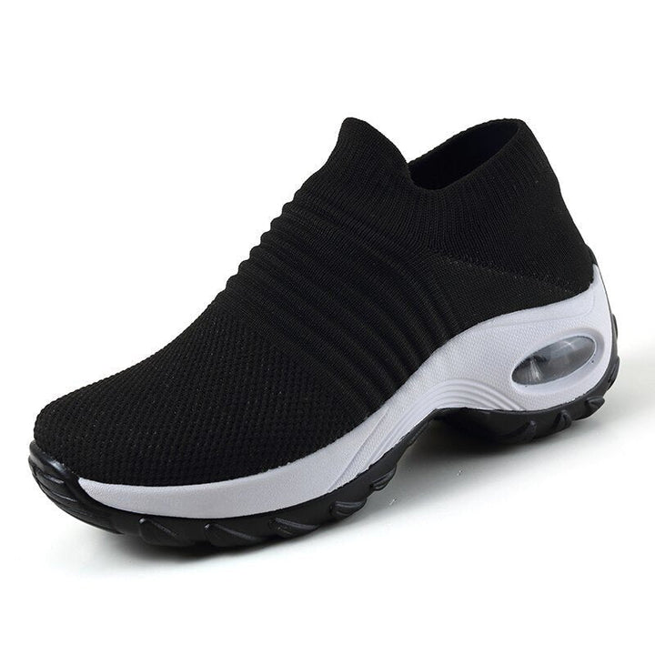 Orthopedic women's trainers with advanced arch support and air cushioning, ensuring comfortable walking shoes.