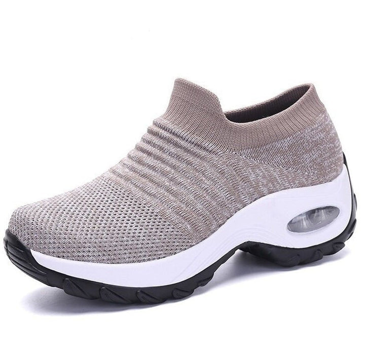 Lightweight women's orthopedic slip-on trainers, designed for comfortable everyday footwear and walking.