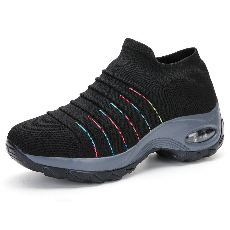 Active women's slip-on trainers, orthopedic design ensures comfortable walking footwear for all-day support.