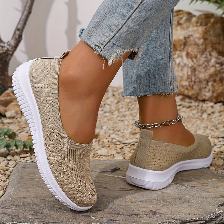 Comfortable women's slip-on sneakers with orthopedic arch support, ideal for walking & foot pain relief.