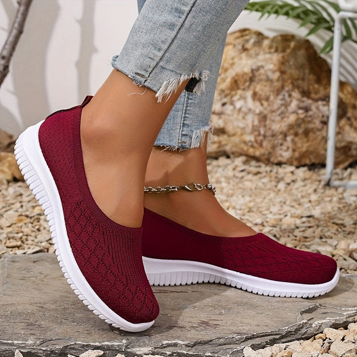 Breathable women's slip-on comfort sneakers, perfect for walking and casual summer wear.
