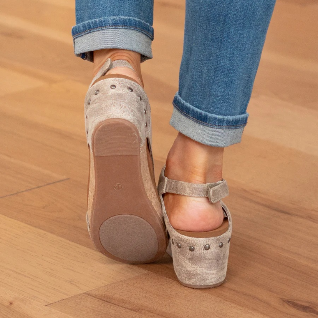 Stylish women's studded platform wedge sandals. Open-toe design, perfect orthopedic summer shoes.