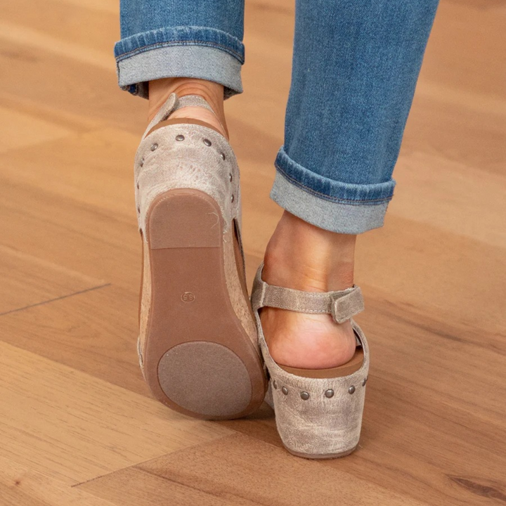 Stylish women's studded platform wedge sandals. Open-toe design, perfect orthopedic summer shoes.