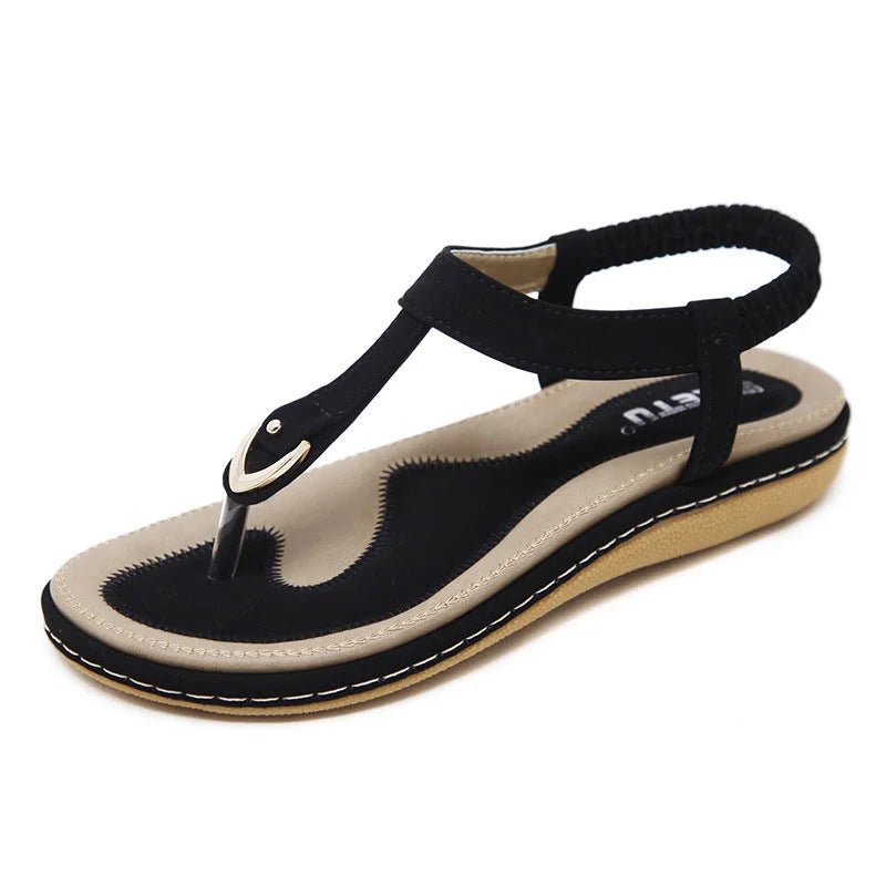 Comfortable women's walking sandals, orthopedic T-strap flats, arch support for all-day wear.