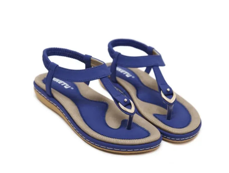 Women's flat orthopedic T-strap sandals, arch support, elastic comfort strap.