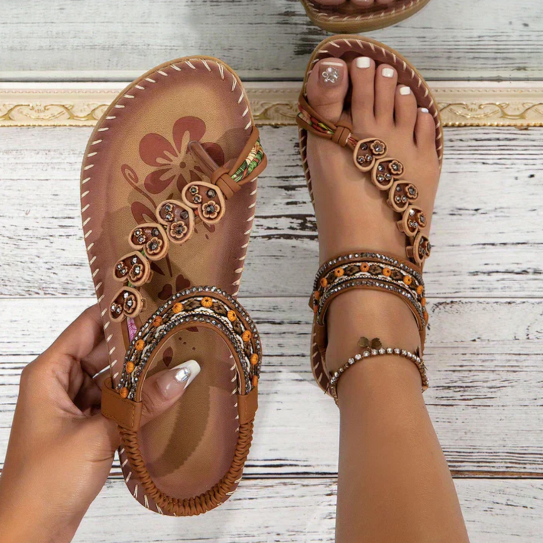 Women's orthopedic T-strap sandals with arch support for all-day comfort and foot alignment.