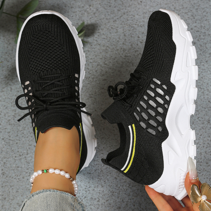 Supportive women's sneakers with wide toe box for foot pain relief & healthy feet.