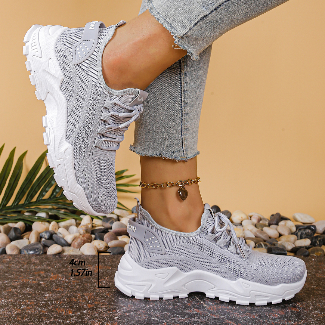Orthopedic women's trainers providing foot pain relief & ergonomic support for comfort.