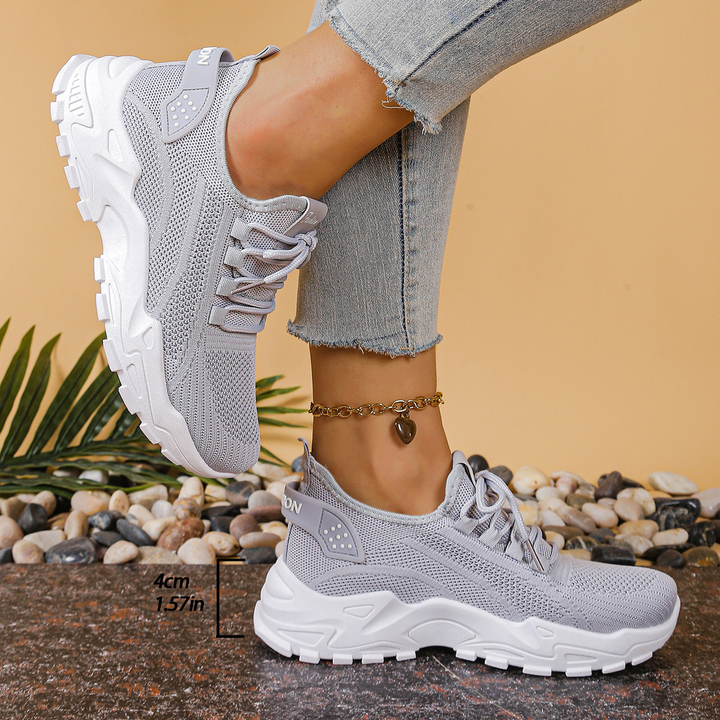 Orthopedic women's trainers providing foot pain relief & ergonomic support for comfort.