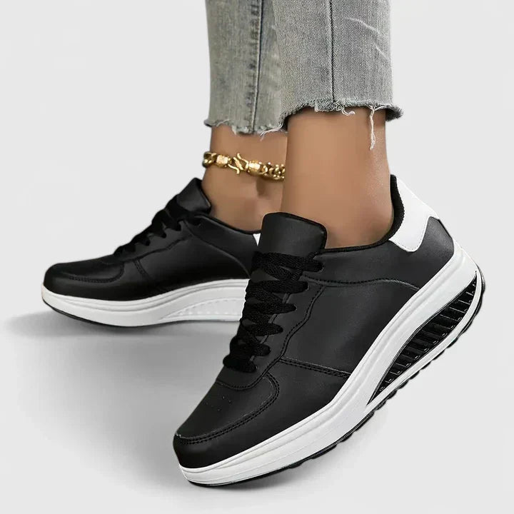 Comfortable women's sneakers with superior arch support, ideal for walking and everyday casual wear.