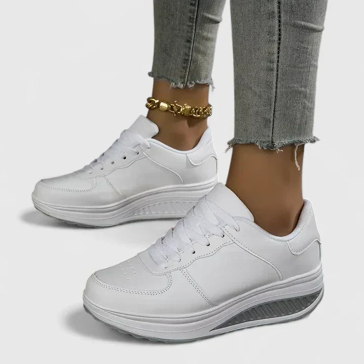Stylish women's casual sneakers, offering orthopedic comfort and essential arch support for daily wear.