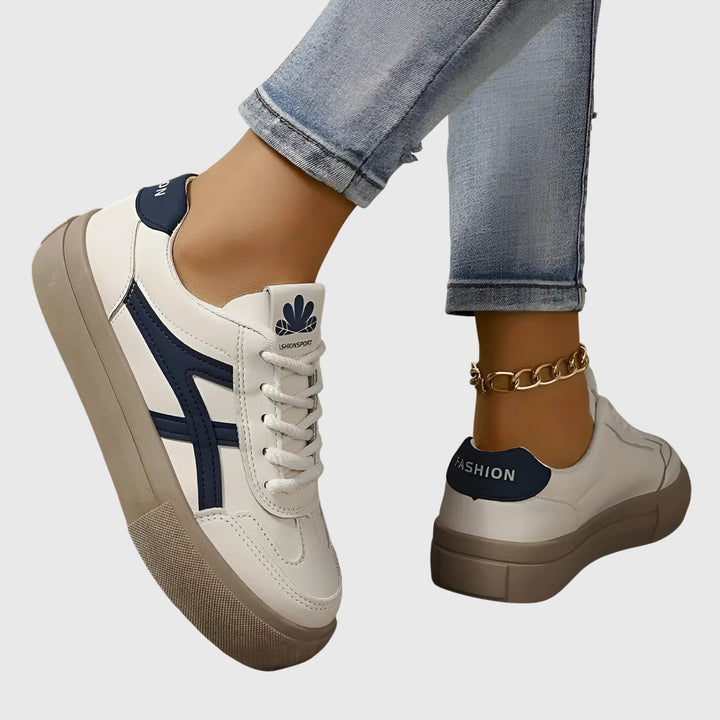 Brown women's orthopedic sneakers, offering foot pain relief & comfort for active walking.