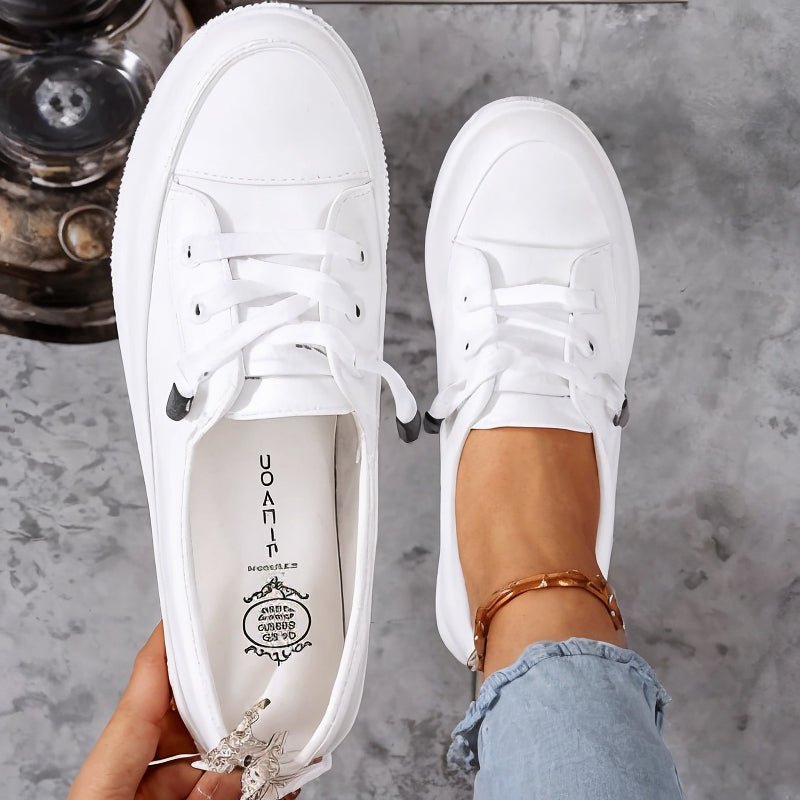 Women's orthopedic trainers with arch support & comfort for walking. Lace-up design, ideal for active everyday wear.