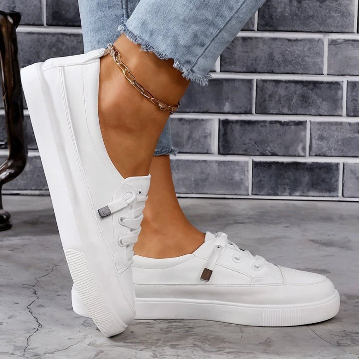 Breathable women's comfort trainers with superior foot support & slip-resistant sole. Perfect for casual walks.