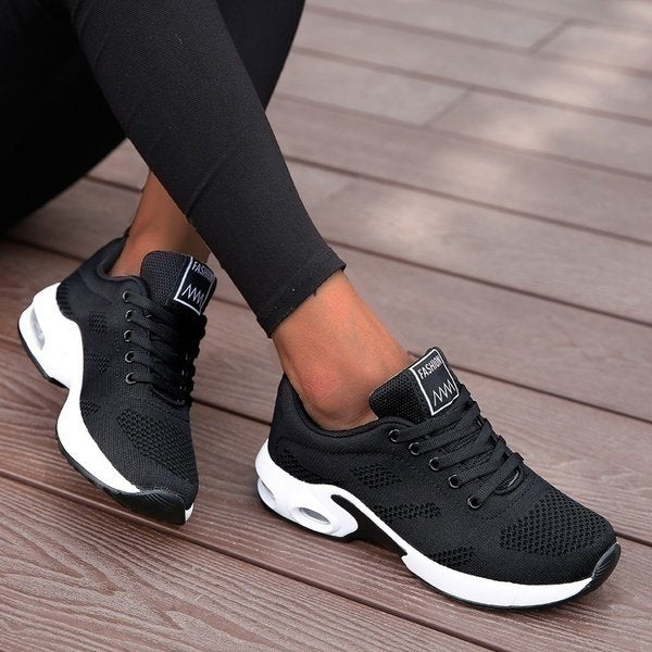 Women's orthopedic trainers with breathable mesh & lace-up design for all-day comfort & ergonomic support.