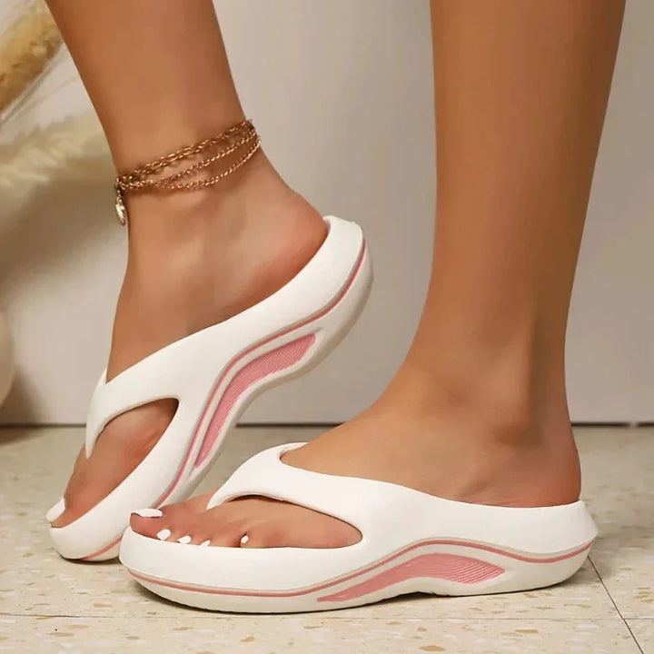 Stylish two-tone platform slide sandals for women. Chunky sole, easy slip-on, casual summer footwear.