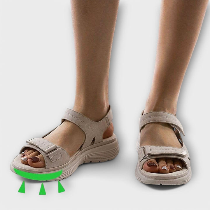 Orthopedic arch support sandals for women, offering relief from plantar fasciitis & heel pain with adjustable fit.