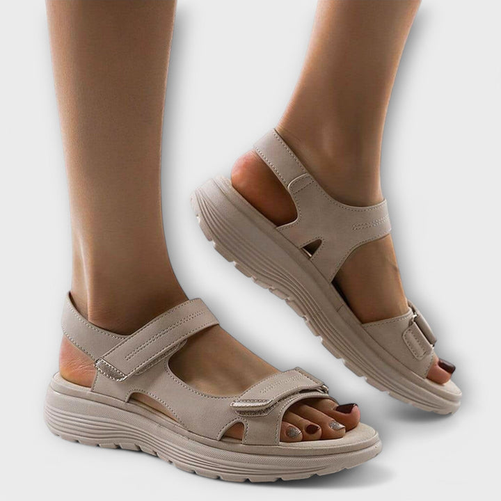 Women's comfort walking sandals featuring adjustable straps, excellent arch support & open toe design for summer.