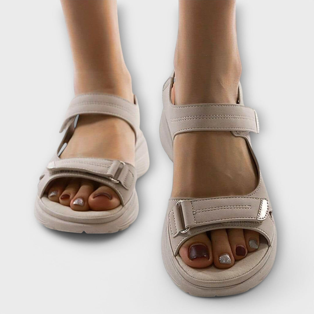 Durable women's orthopedic sandals with foot support, arch comfort & adjustable straps, perfect for long walks.