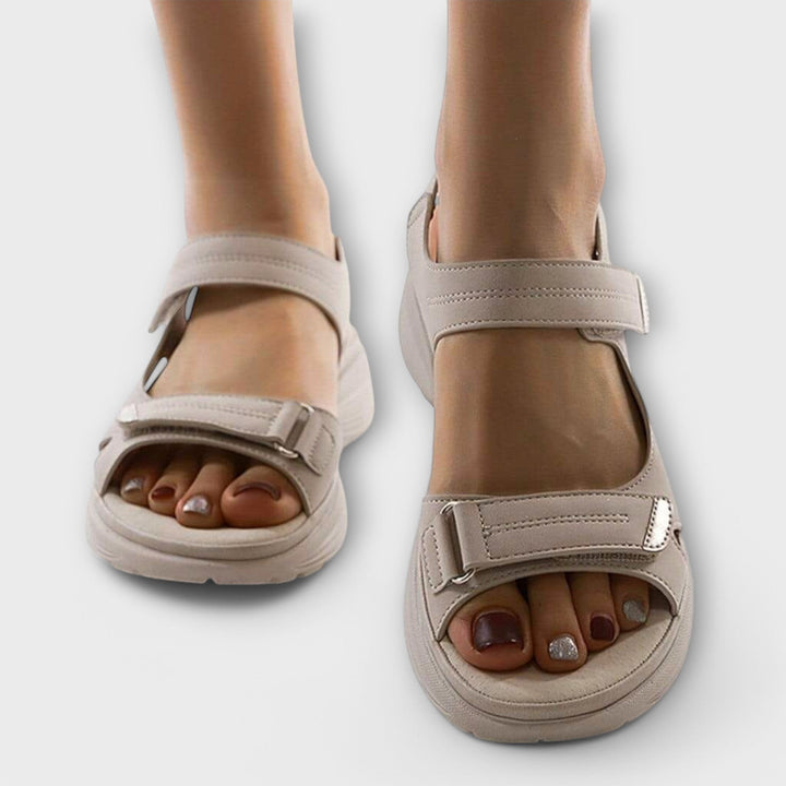 Durable women's orthopedic sandals with foot support, arch comfort & adjustable straps, perfect for long walks.