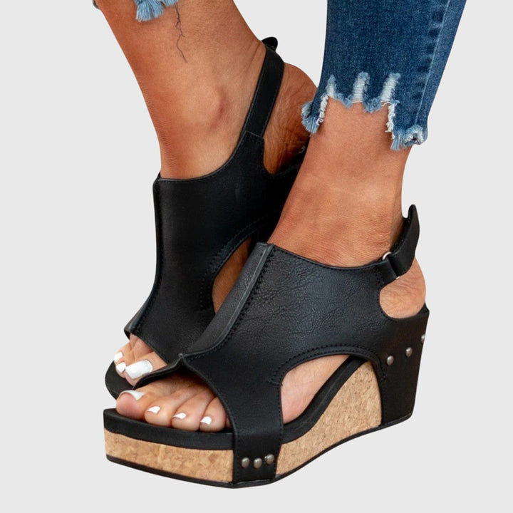 Open-toe orthopedic wedge sandals for women. Provides comfortable support for versatile casual & summer style.