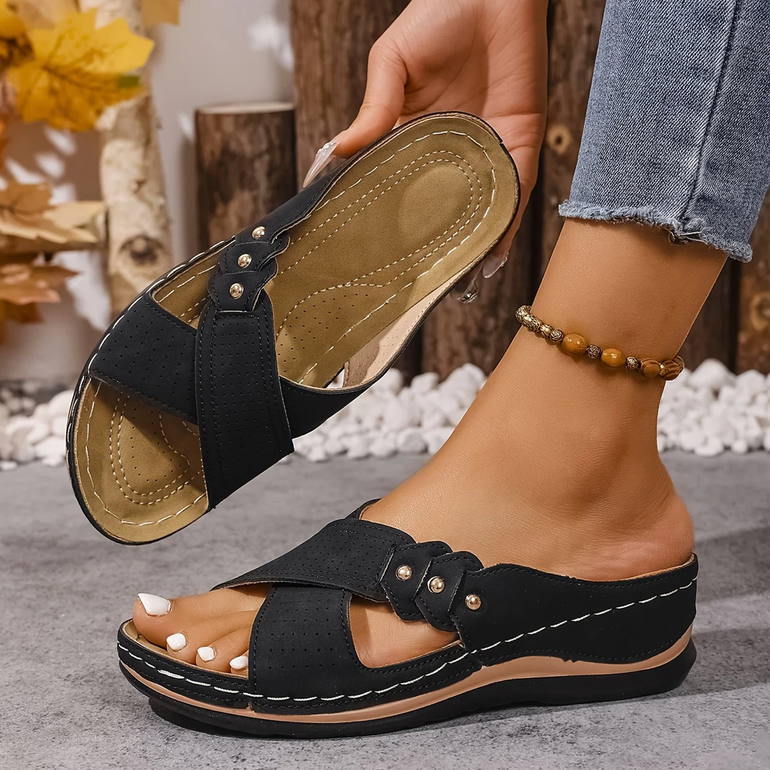 Comfortable women's orthopedic wedge sandals with arch support. Stylish summer footwear for foot health & elegance.